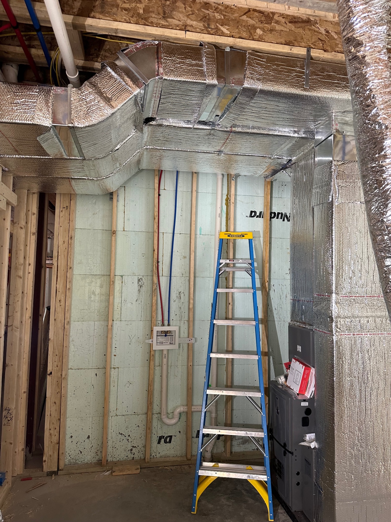 New sheet-metal trunk ductwork roughed in for a Nantucket home